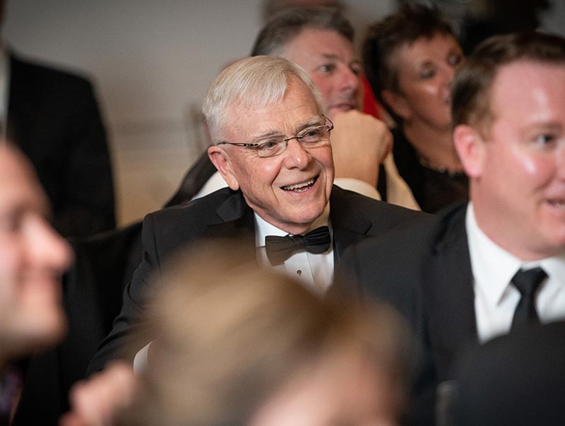 Long-time GMCH physican, Dr. John Stickney, smiles during the speeches at the Gala